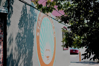 Standing Akimbo Denver