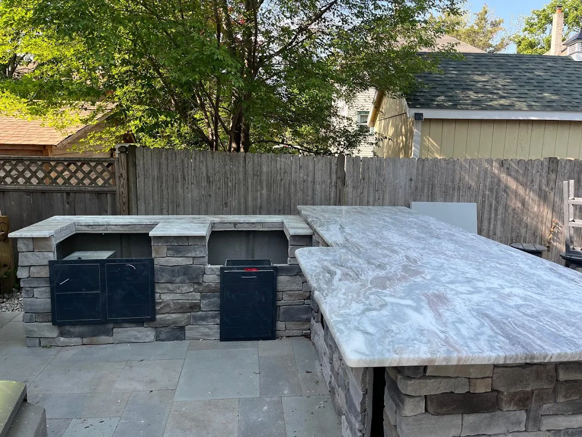 Designer Den Surfaces, LLC