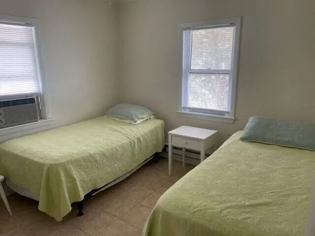 Great location. This ranch style duplex features two bedrooms and one bath. Window air conditioning and nice patio with gas grill, table and chairs. Off street parking. Just a short stroll to the beach and all that Stone Harbor has to offer! Pe