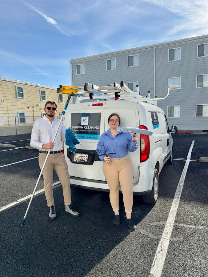 Squeegee Together Window Cleaning