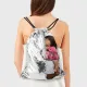 Sparkling sequin backpack featuring a cute girl and toy design, perfect for trendy kids.
