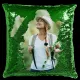 Vibrant green sequin pillow featuring a joyful outdoor image of a woman enjoying nature.