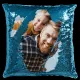 Turquoise sequined pillow featuring a heartwarming family photo of laughing man and child.