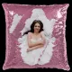Elegant woman in white dress on vibrant pink sequin pillow, perfect for stylish decor.