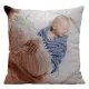 Decorative cushion showcasing the loving bond between a mother and her newborn baby.